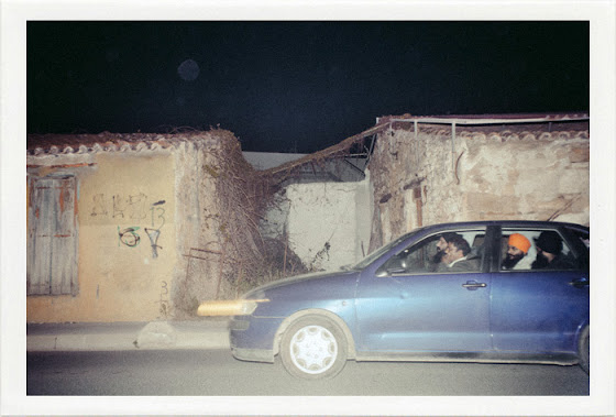 dirty photos - umbra - a night street photo of INDIAN SKHS IN A CAR
