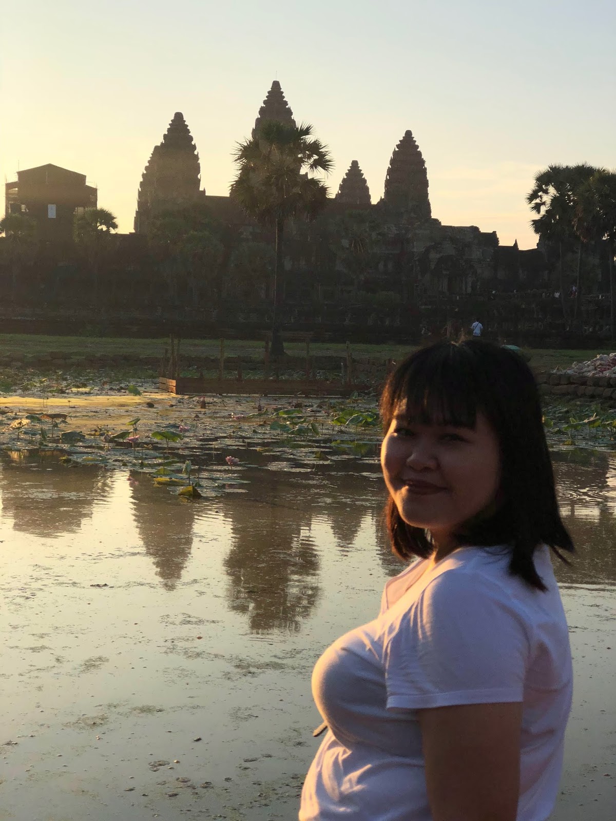 Ton having her turista shot in front of Angkor Wat