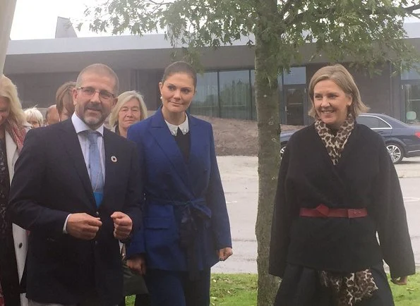 Crown Princess Victoria wore Af Klingberg Rakel Suede Nero Boots, Dagmar Taylor Tote Bag. Blue wool coat