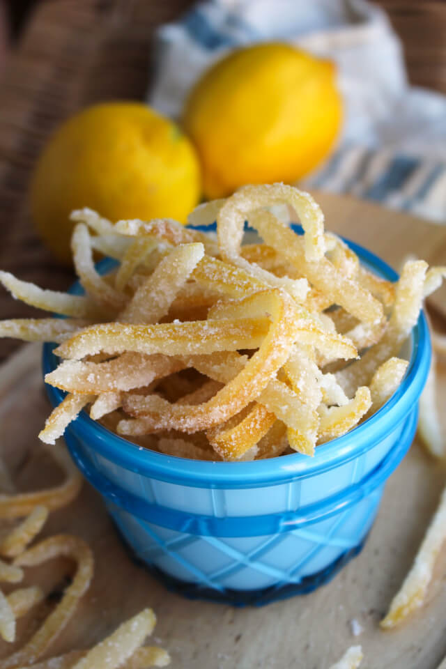 Making Candied Lemon Peel is a way to practice the 'waste not, want not way' of life by transforming the lemon peel you would normally discard into an irresistible sweet snack!  #feastndevour