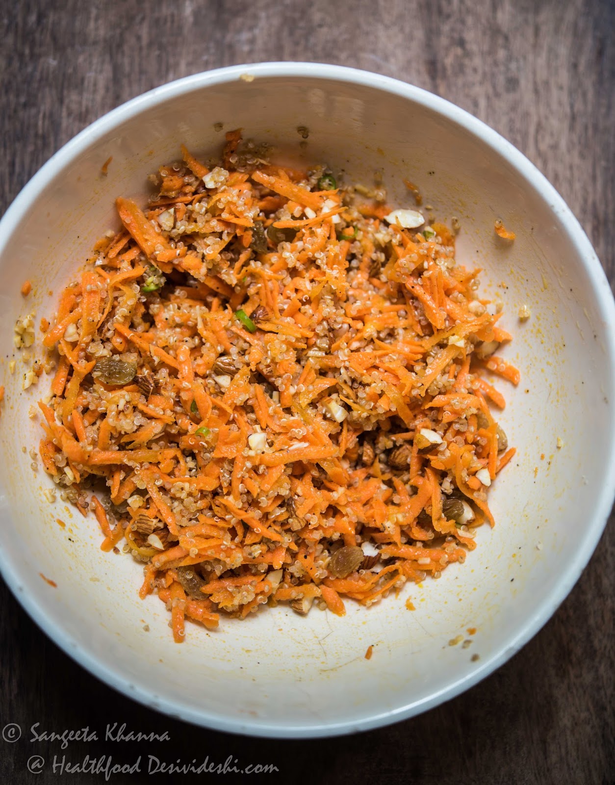Quinoa salad with carrots, walnuts and raisins