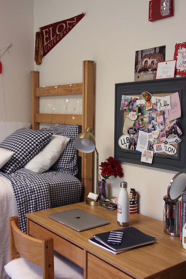 Preppy navy and white college dorm room. Elon University.