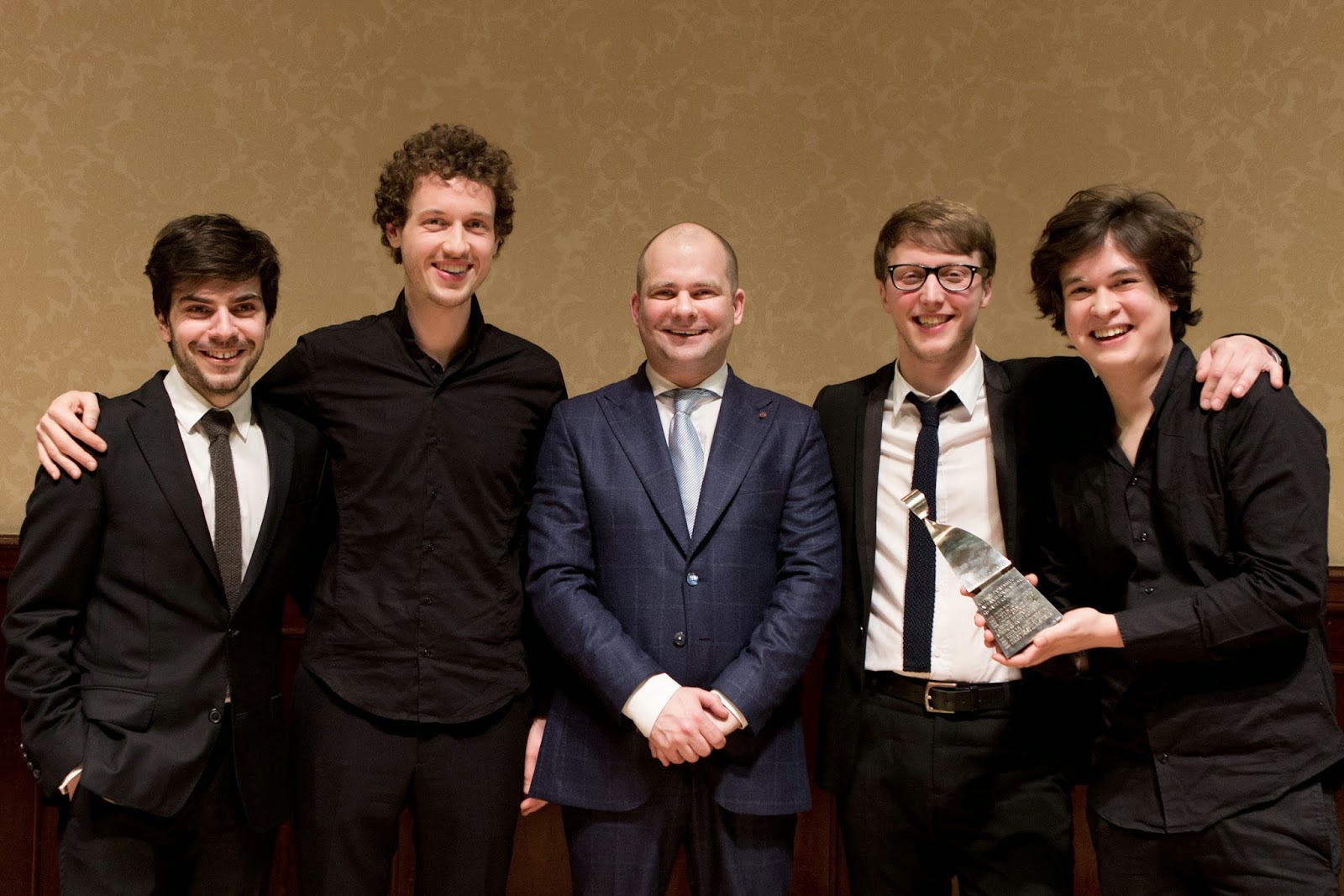 Van Kuijk Quartet receiving their award from competition chairman John Gilhooly - photo Ben Ealovega
