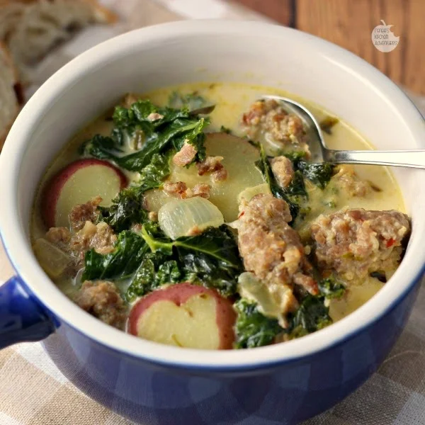 Skinny Zuppa Toscana Soup in a bowl with a spoon