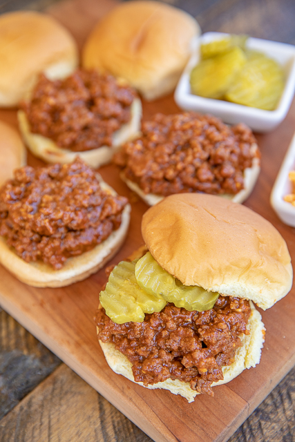 Instant Pot Sloppy Joes - seriously delicious! Hands down THE BEST Sloppy Joes we've ever eaten! Ground beef, garlic, tomato sauce, BBQ sauce, cider vinegar, brown sugar, dijon mustard, Worcestershire sauce, chili powder and onion powder. So simple to make in the electric pressure cooker. Serve on slider buns with pickles, cheese and mustard. Everyone raved about these sandwiches. Even our Sloppy Joe haters cleaned their plate! YUM! #instantpot #sloppyjoe #beef #sandwich Instant Pot Sloppy Joes - seriously delicious! Hands down THE BEST Sloppy Joes we've ever eaten! Ground beef, garlic, tomato sauce, BBQ sauce, cider vinegar, brown sugar, dijon mustard, Worcestershire sauce, chili powder and onion powder. So simple to make in the electric pressure cooker. Serve on slider buns with pickles, cheese and mustard. Everyone raved about these sandwiches. Even our Sloppy Joe haters cleaned their plate! YUM! #instantpot #sloppyjoe #beef #sandwich