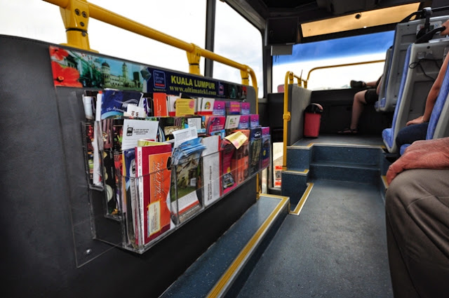 My first tour in Kuala Lumpur and Hop-On Hop-Off ride Pamphlets, directories and maps of Kuala Lumpur city