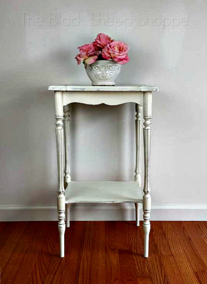 Side table with a shabby chic finish. Side table with a shabby chic finish.