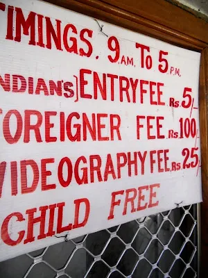 Sign with disparate prices for locals and foreigners in Hyderabad India