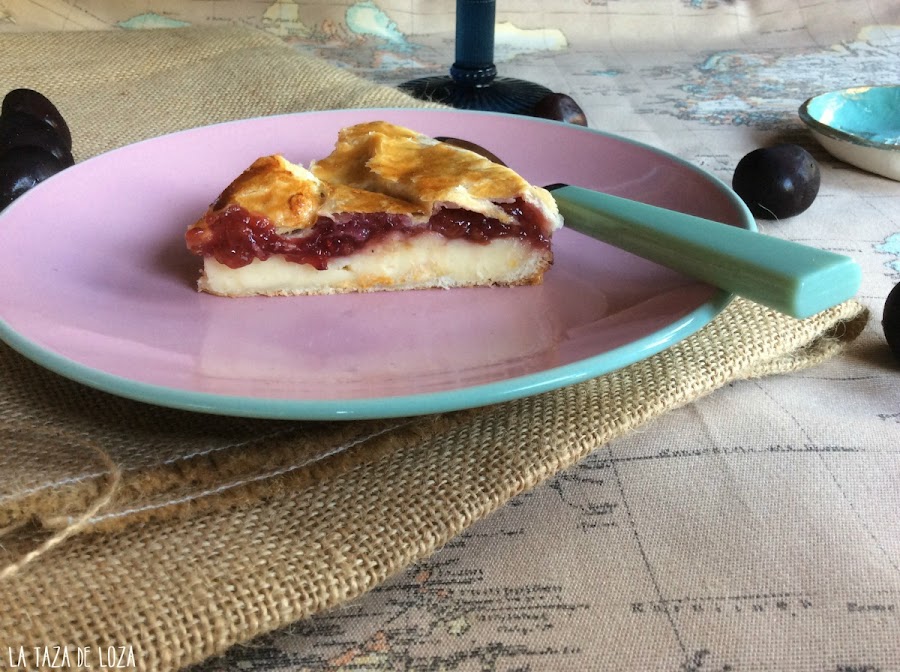 porción-de-pastel-vasco-relleno-de-crema-pastelera-y-cerezas