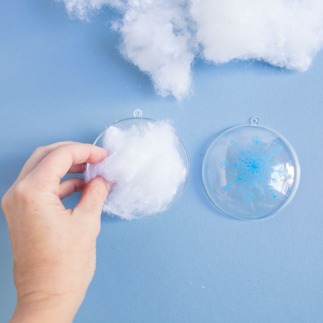 Stencil clear ornaments with snowflakes and fill them with snow! #christmasornaments #snowflakeornaments #clearornaments #marthastewartcrafts #plaidcrafts Stencil clear ornaments with snowflakes and fill them with snow! #christmasornaments #snowflakeornaments #clearornaments #marthastewartcrafts #plaidcrafts