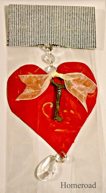 red heart ornament in cello bag