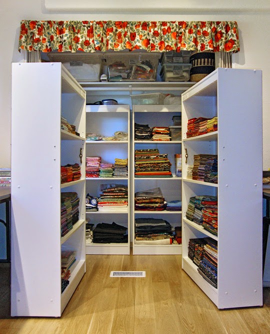 frabric storage system: Front storage units rolled out of closet