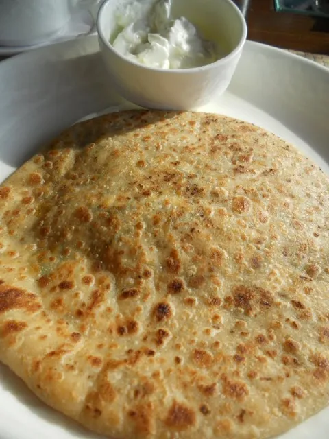 What to eat in Delhi India: cheese filled paratha