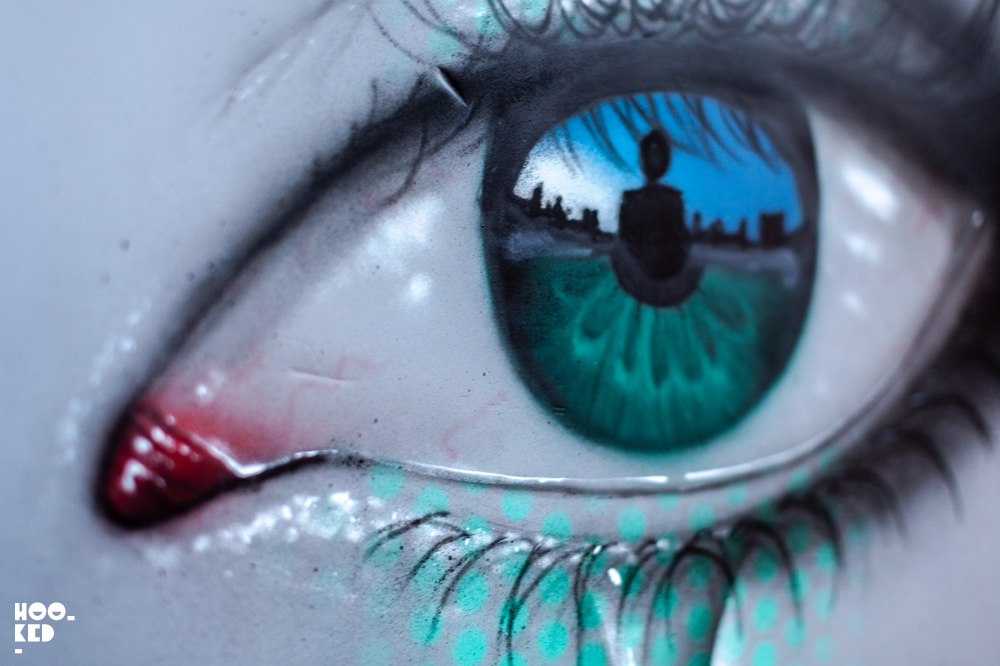 Street Artist My Dog SIghs at work in Cheltenham, UK for the Cheltenham Paint Festival