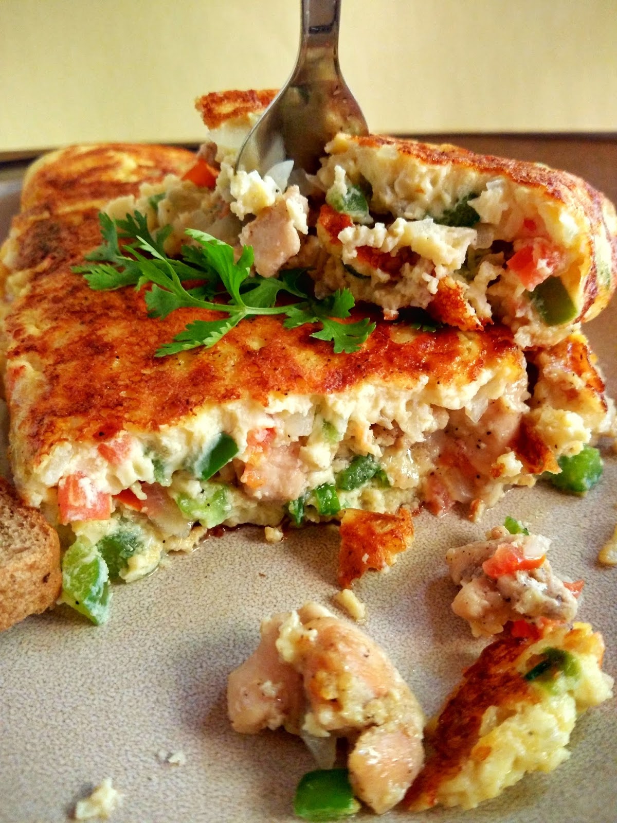 Cheesy Chicken filled Omelette Garlic Chicken Omelette Tempting Treat