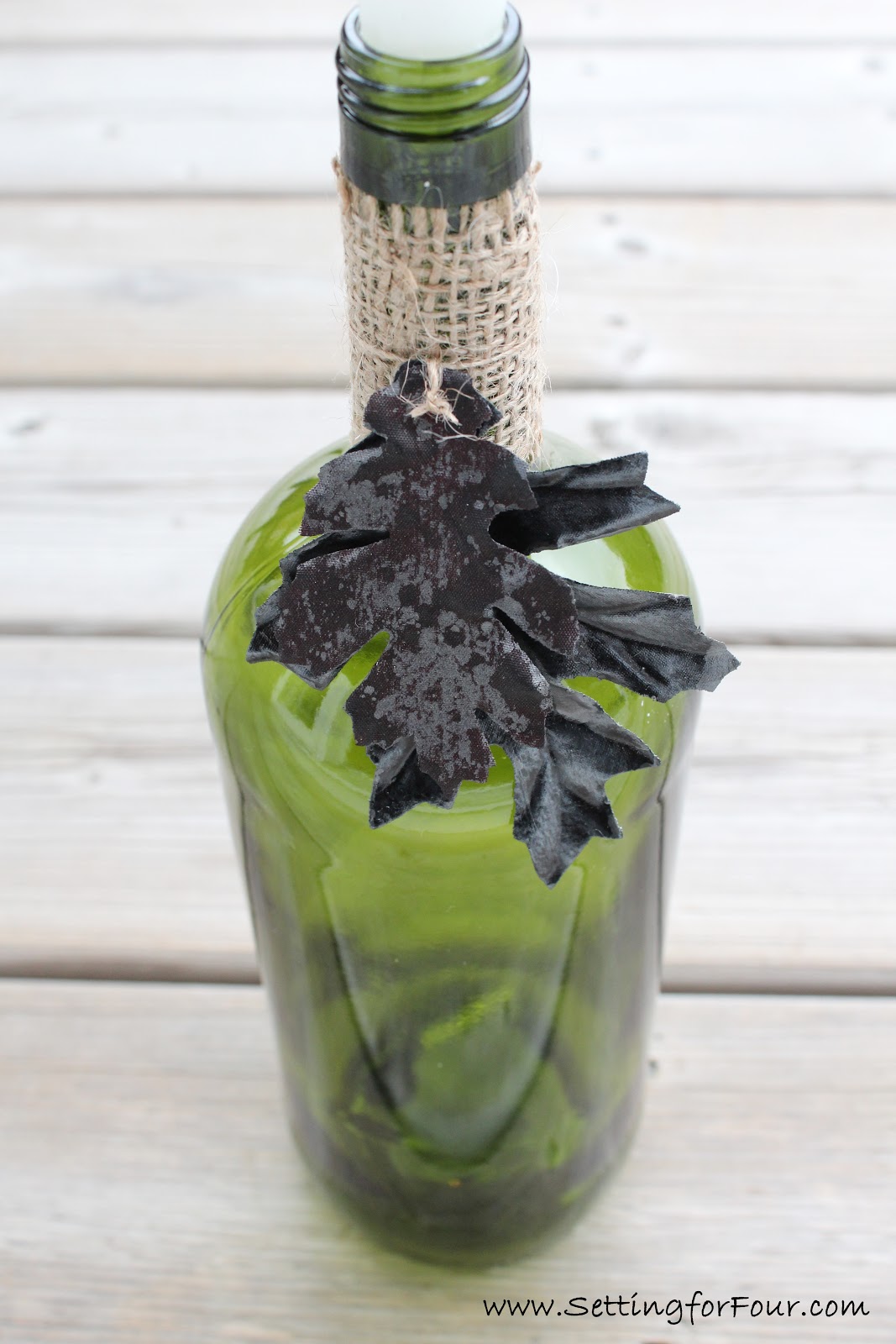 DIY Wine Bottle Candle Holder with Metallic Accents Setting for Four