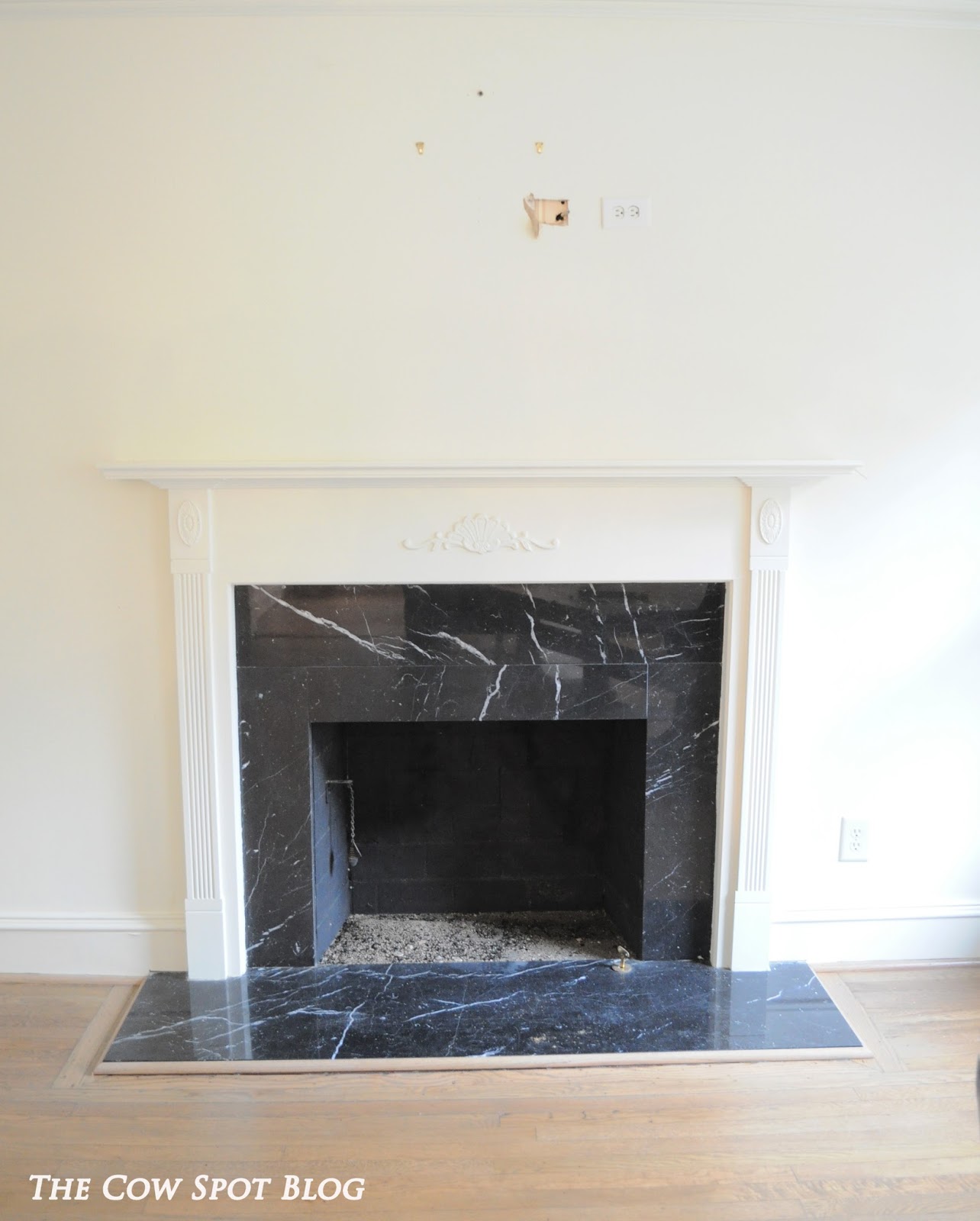 The Cow Spot Walnut Fireplace Surround