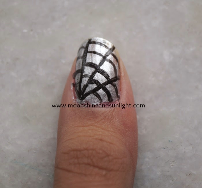 Tiny spider halloween nail art , Black and silver halloween nails 