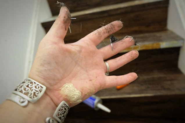 adhesive and fur covered hand