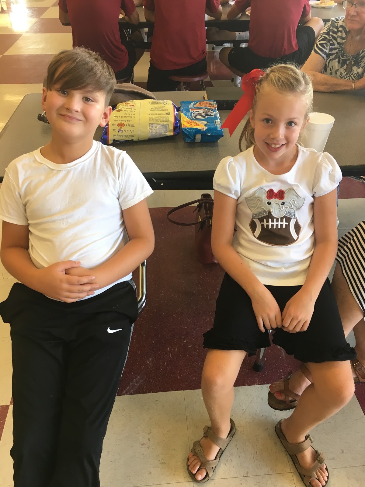 Maggie Elizabeth Feeding the Football Team