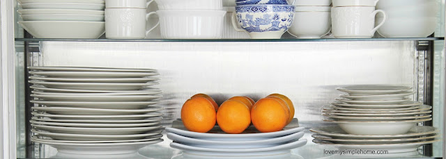 organizing -ideas-for-glass-front-cabinets