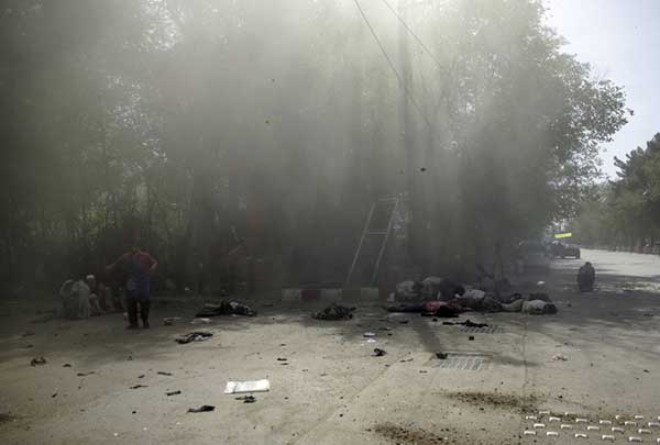 fotos niños y periodistas muertos  triple atentado Kabul, Afganistán,
