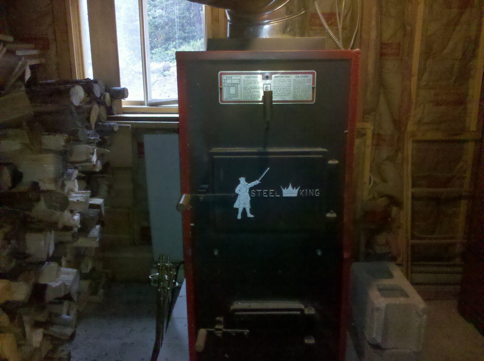 At The End of The Grid Heating with a WOOD Furnace!