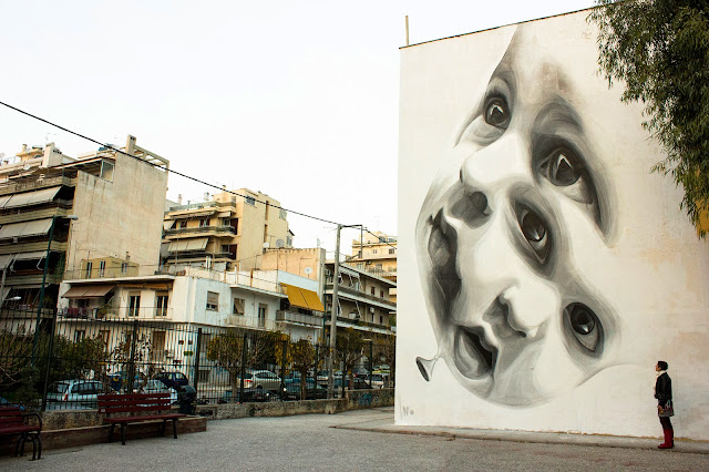 "New Future" Mural By Greek Street Artist iNO on the streets of Athens in Greece.