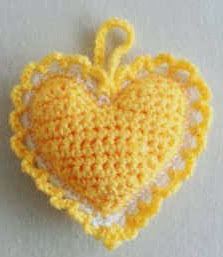 http://www.bestfreecrochet.com/2012/03/14/free-crochet-pattern-heart-sachet-74/