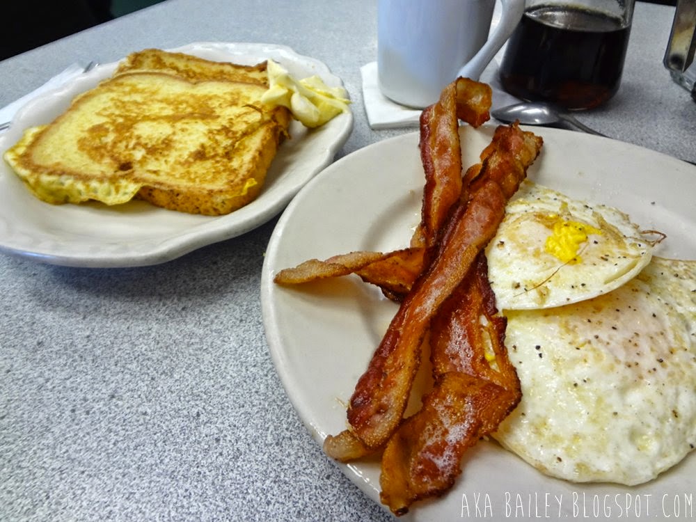 French toast, bacon, eggs, and coffee, breakfast from Donut Villa