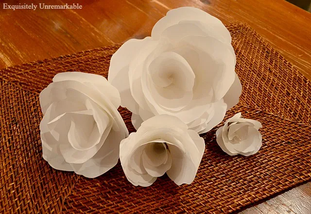Paper flowers on a wicker placemat