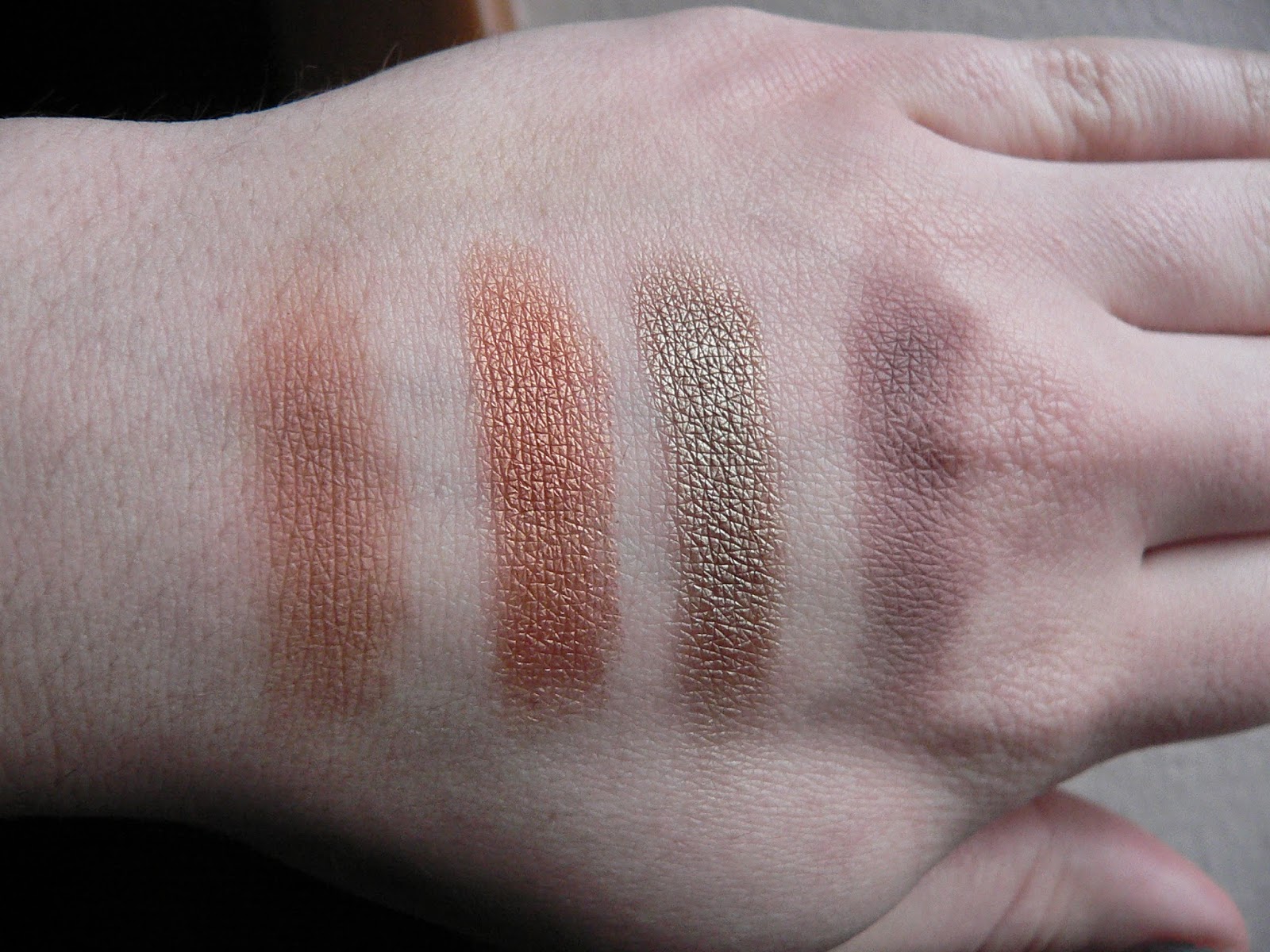 MAC Eye Shadow Swatches: (Left to Right) "Bamboo", "Amber Lights", "Sumptuous Olive", "Quarry"