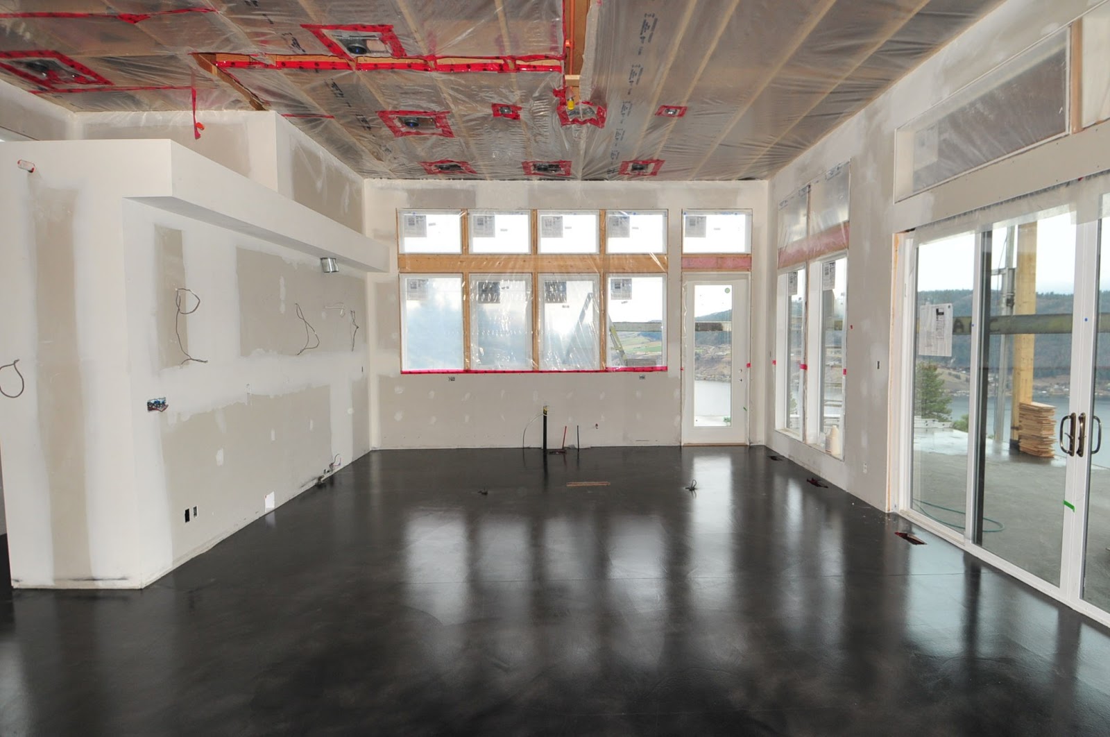 MODE CONCRETE Black Acid Stained Modern Concrete Floor created in