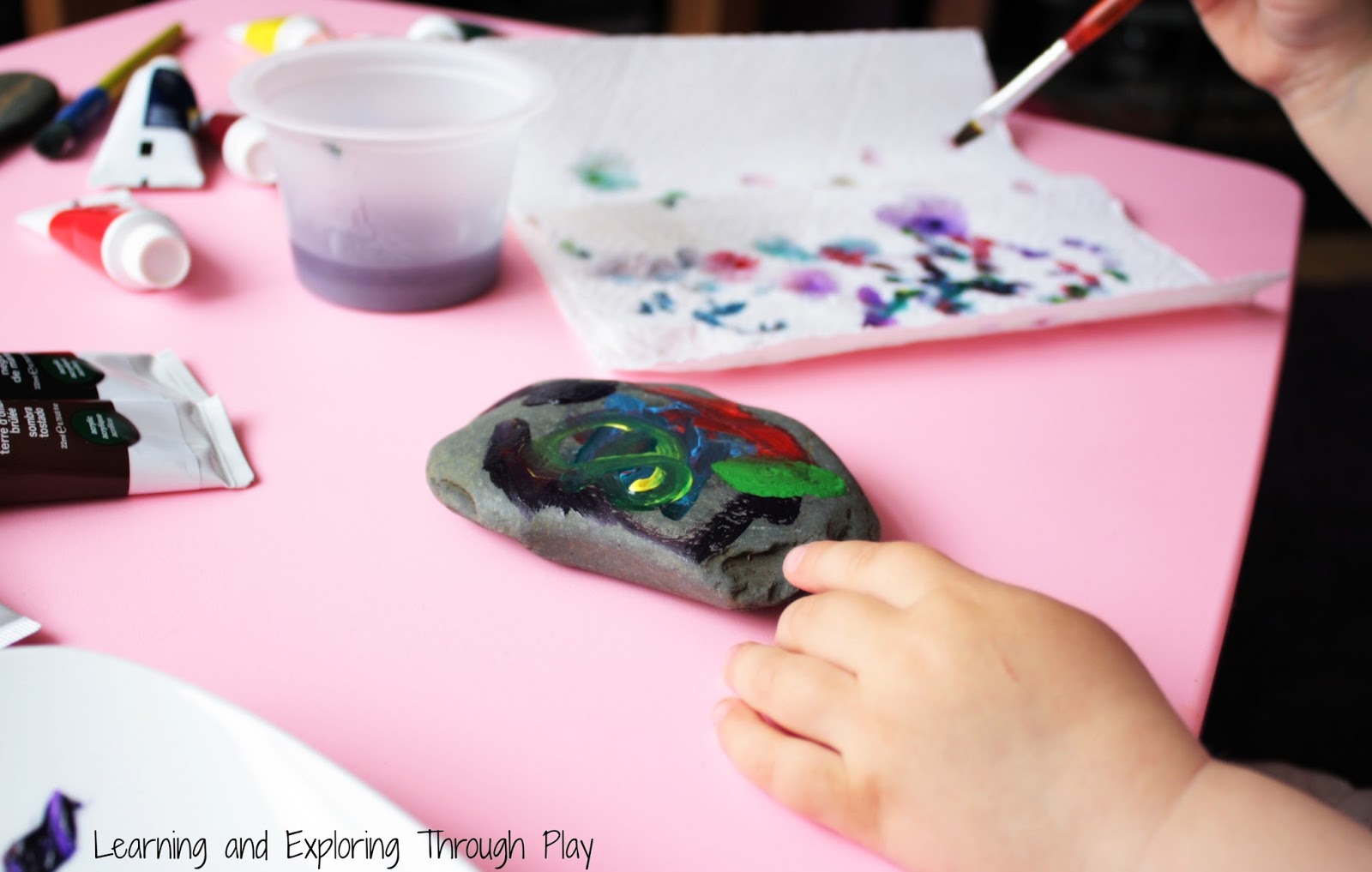 Learning and Exploring Through Play: Painting Memory Rocks