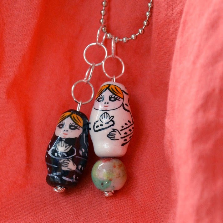 http://www.lovelywren.com/matryoshka-doll-necklace/