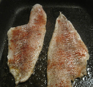 raw fish fillets with cayenne pepper