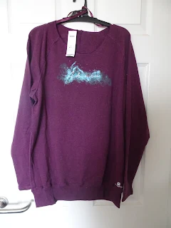 red wine coloured jumper with long sleeves 