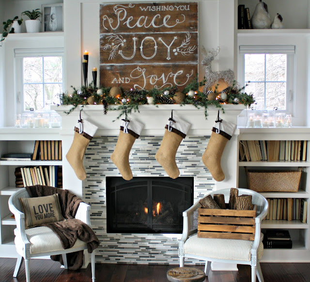 A living room filled with furniture and a fire place sitting in a chair