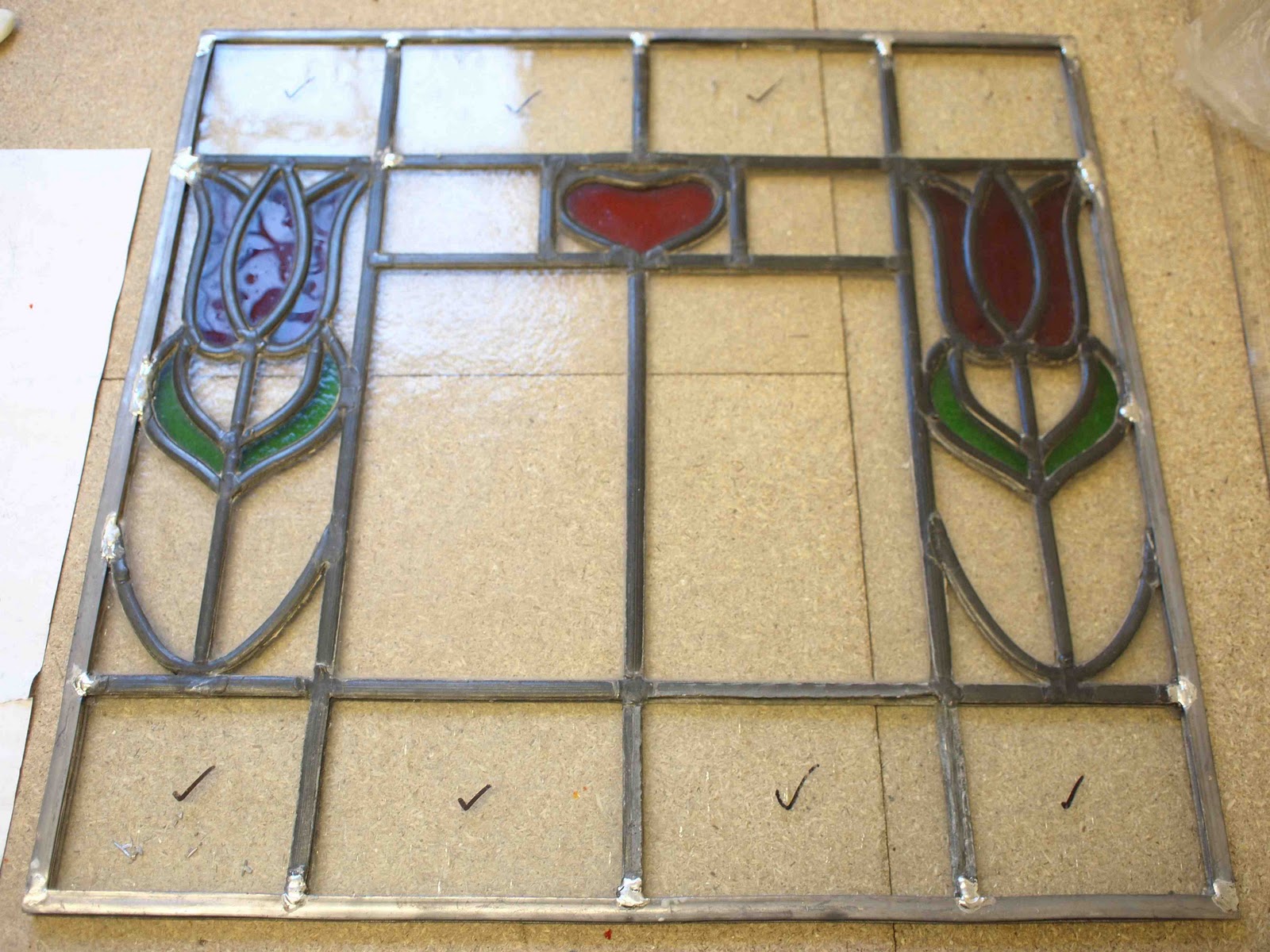 R. G. Croudace Stained Glass Old stained glass panels restored