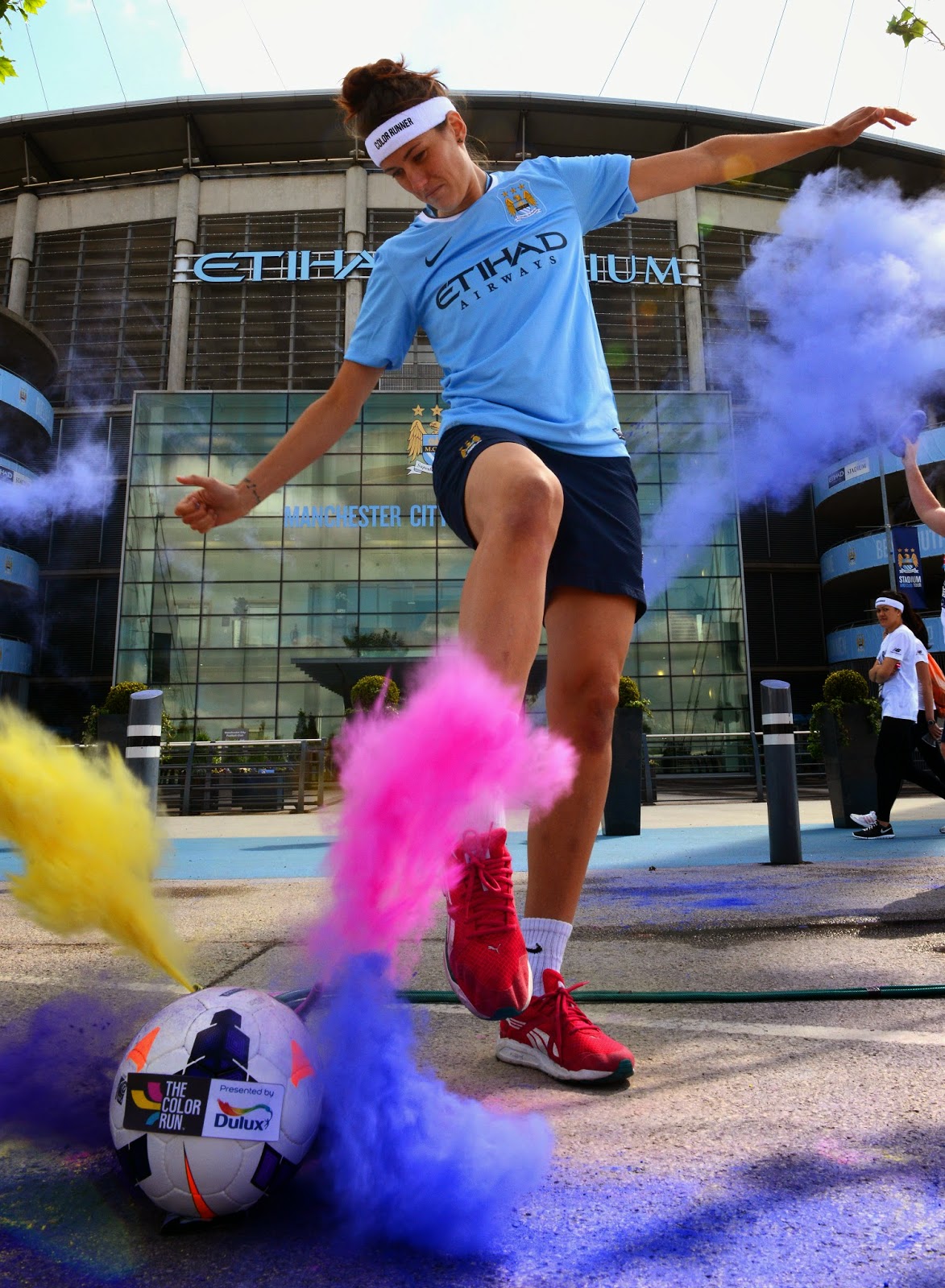 She's on the ball: Manchester City WFC Paint The Town Red... 