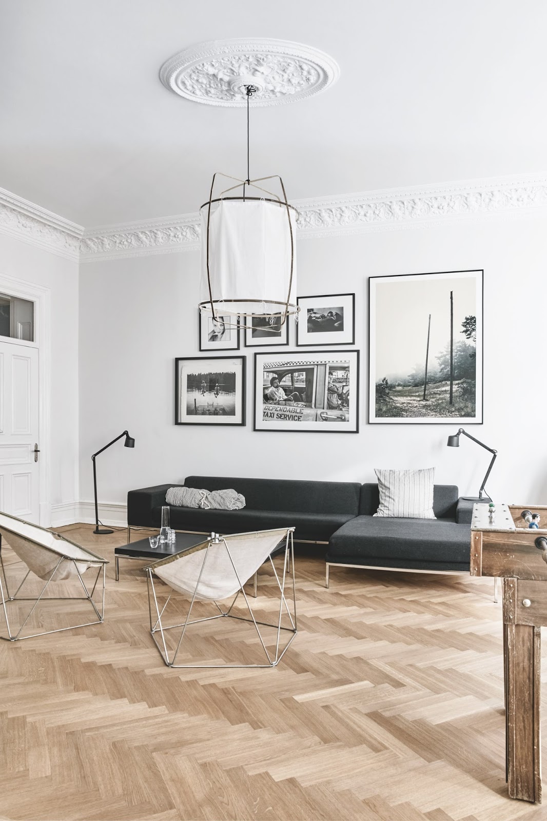 amazing scandinavian apartment with stuccoes, wooden floors and mid century modern furniture