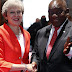 Theresa May dances in South Africa, says UK supports land reform