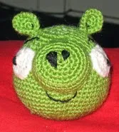 http://www.ravelry.com/patterns/library/angry-birds-evil-green-pig