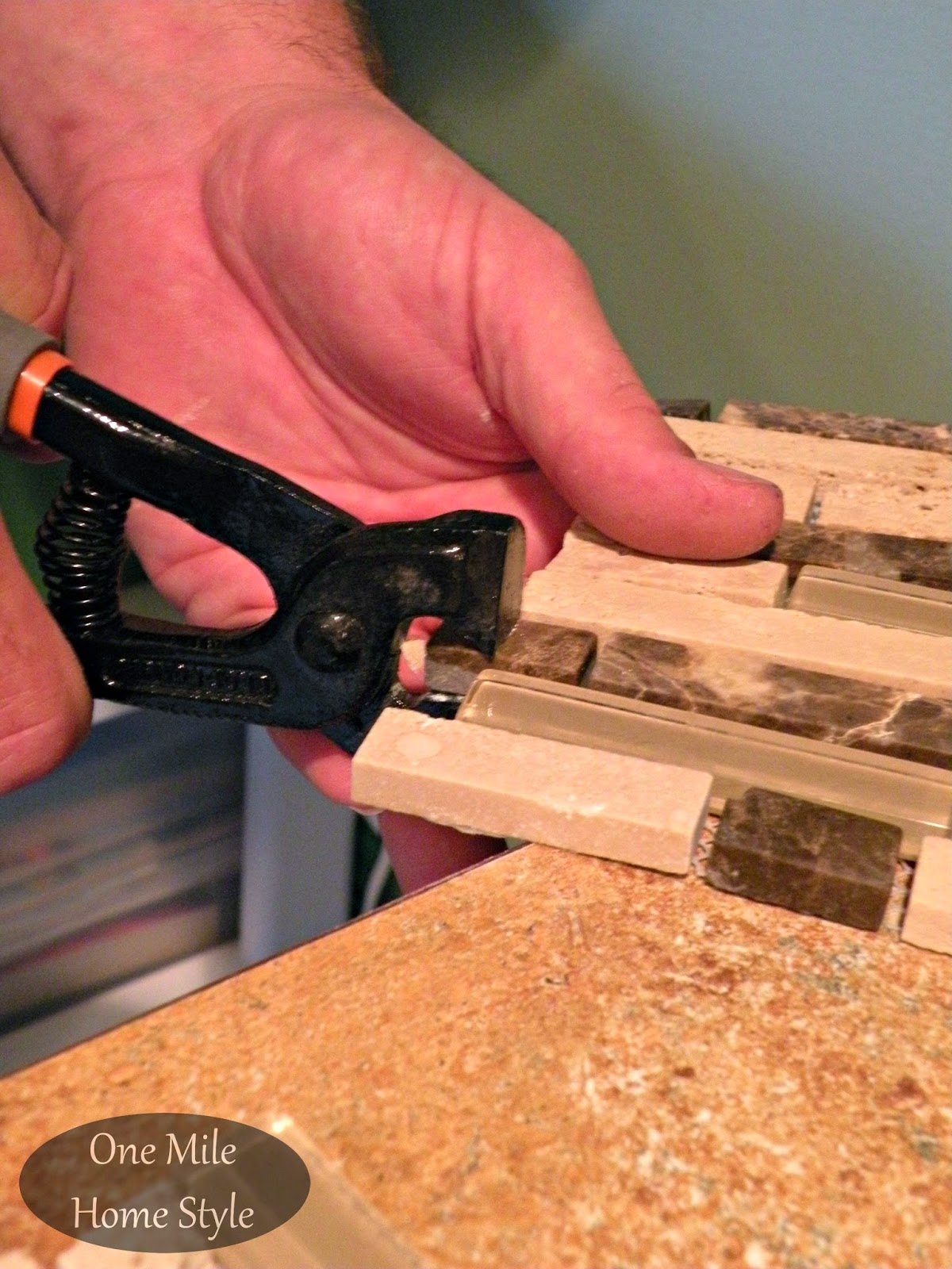 Cutting mosaic tile with tile nippers