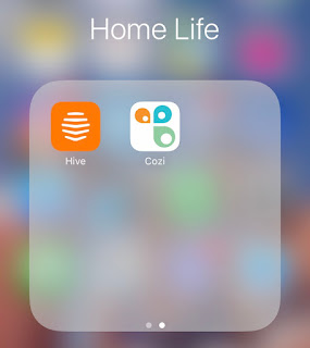 An iPhone screenshot of a folder called Home Life with Hive and Cozi apps in