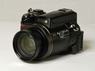 Nikon Coolpix 8800, prosumer camera, bridge camera, DSLR camera, mirrorless camera, lens, interchangeable lens, RAW format, entry level DSLR camera, photography