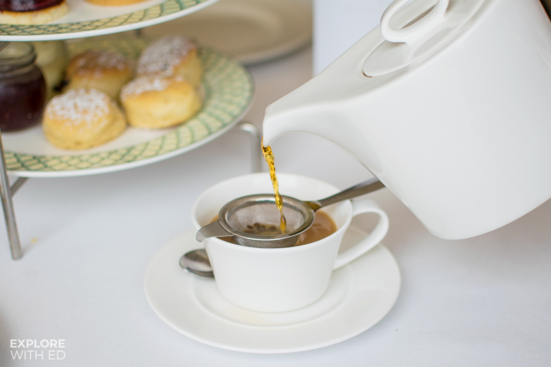 Pouring a Assam Breakfast Tea with Scones at The Celtic Manor