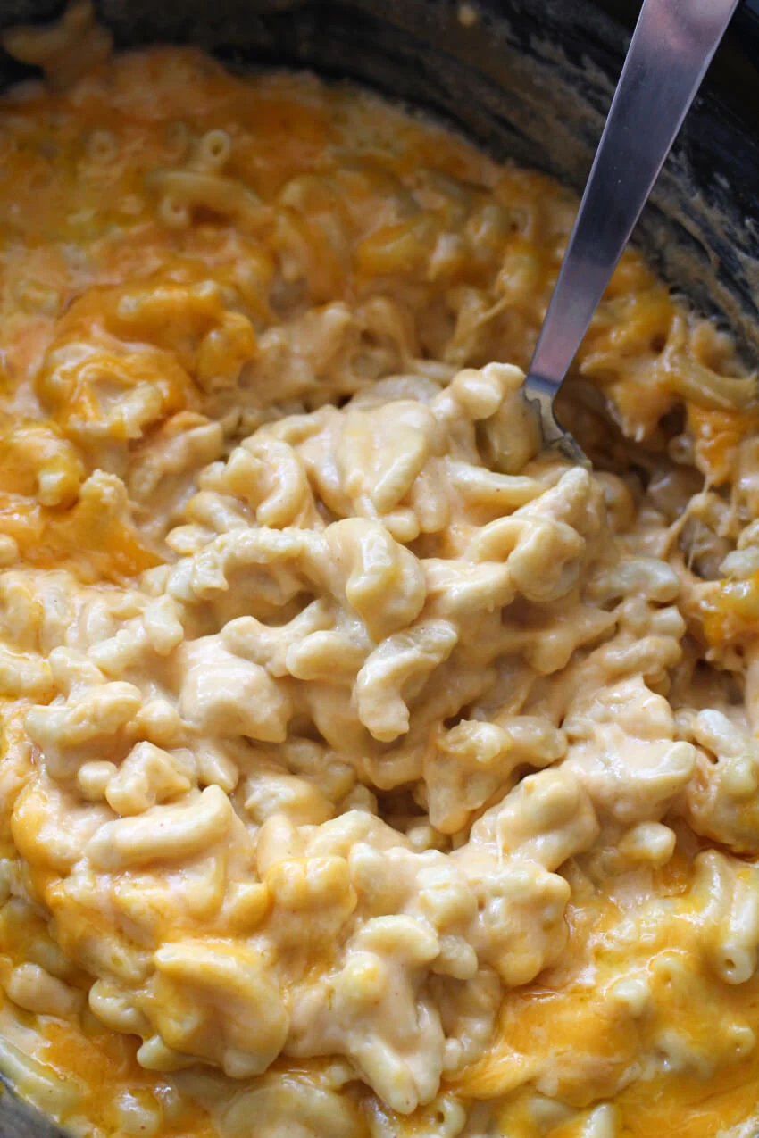 This Creamy Crock Pot Macaroni and Cheese is ultra rich and creamy made with cream cheese, cheddar cheese, and NO canned soups!  #macandcheese #crockpot
