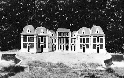 b/w image of Versailles model with mansard roofs in place.