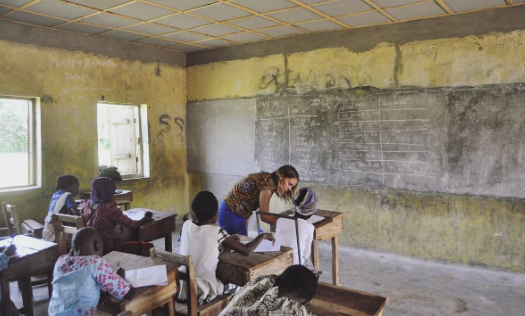 Corina teaching English in Oke-Ode community